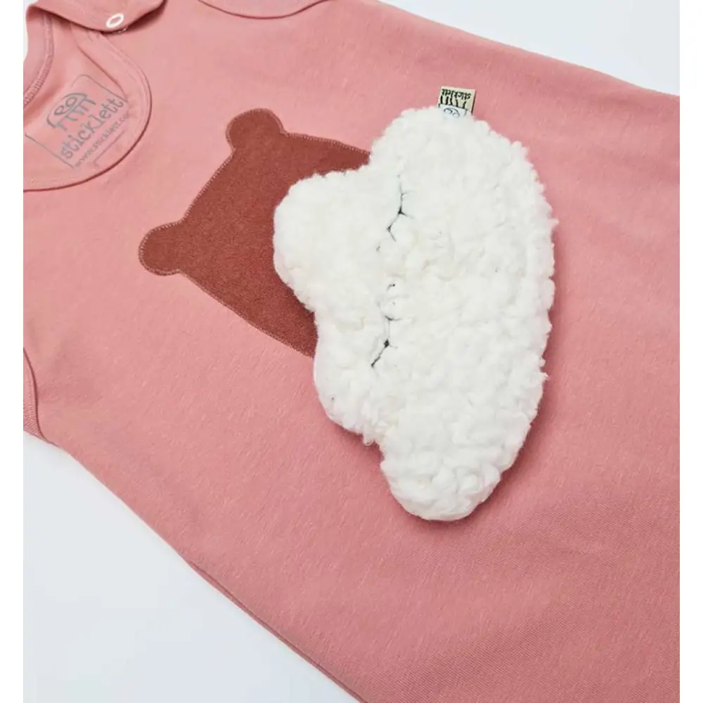 Strampler-peach-mit-Waermekissen